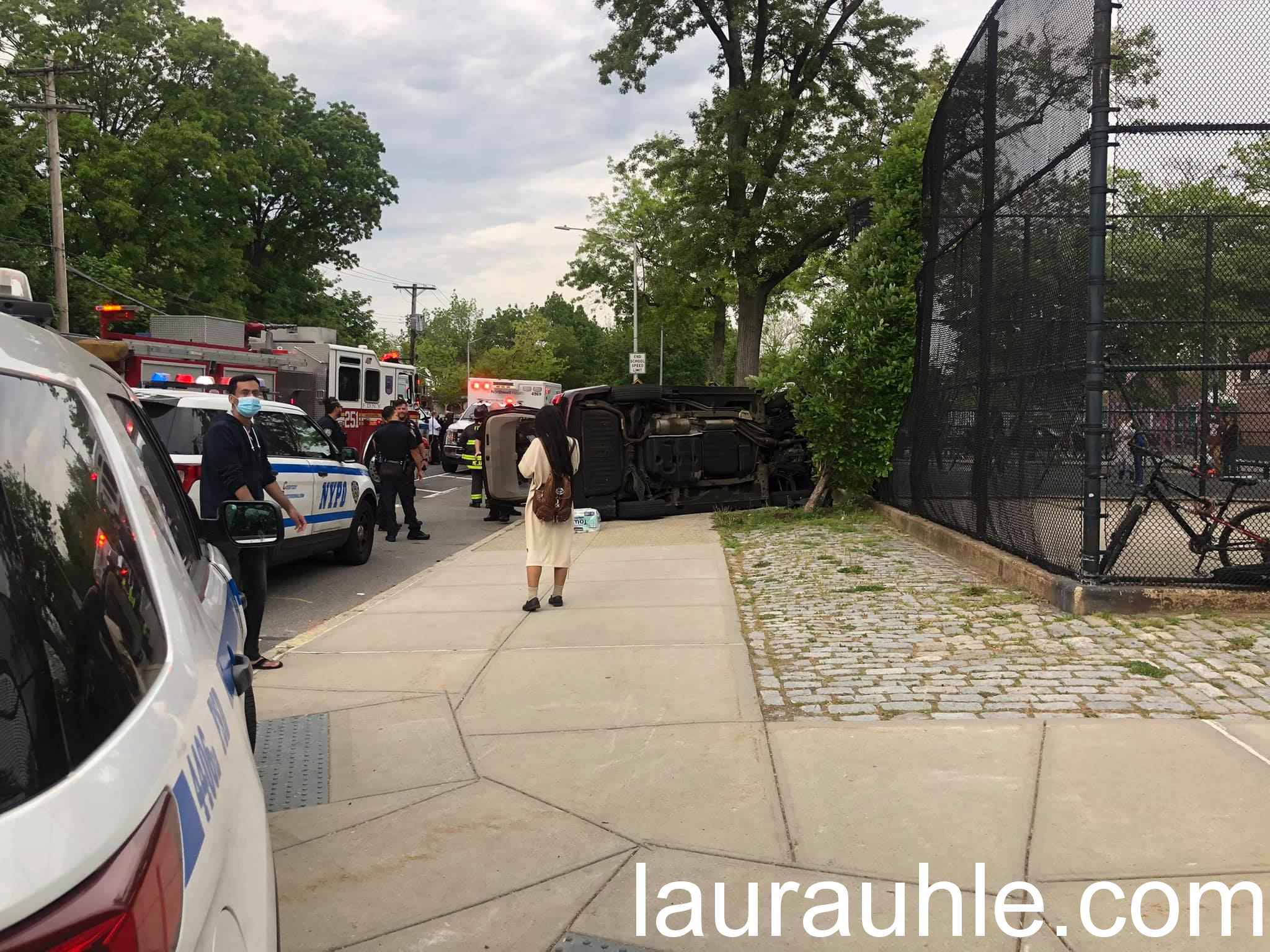 Vehicle accident with one auto flipped on 80th Avenue and 261 Street in Floral Park. 