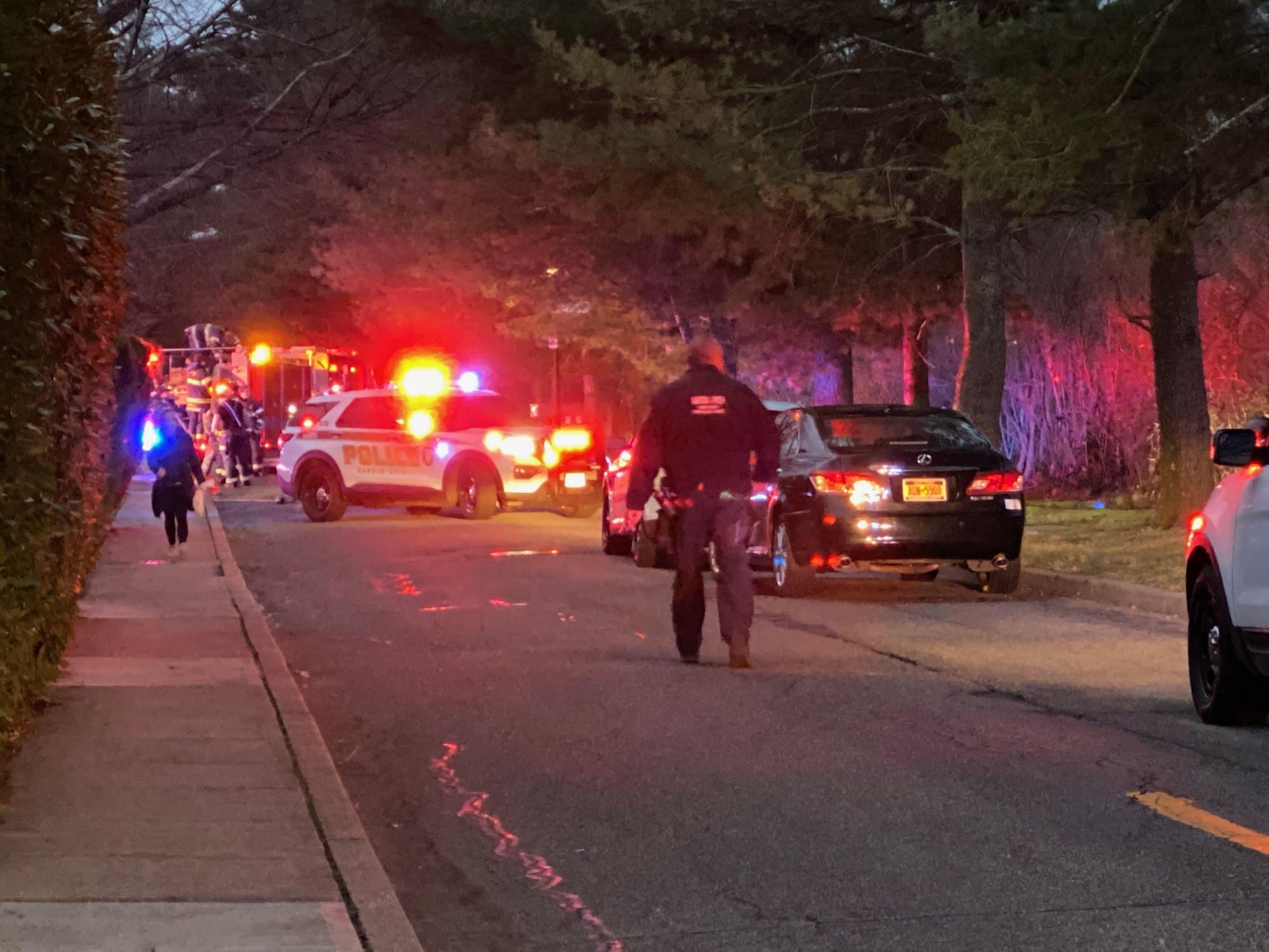 Car fire on the train tracks in Garden City.