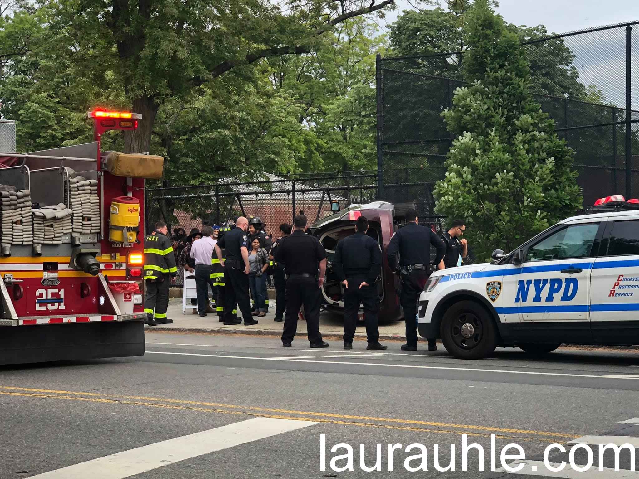 Another image from a different view of vehicle accident with one flipped on 80th Avenue and 261 Street in Floral Park. 