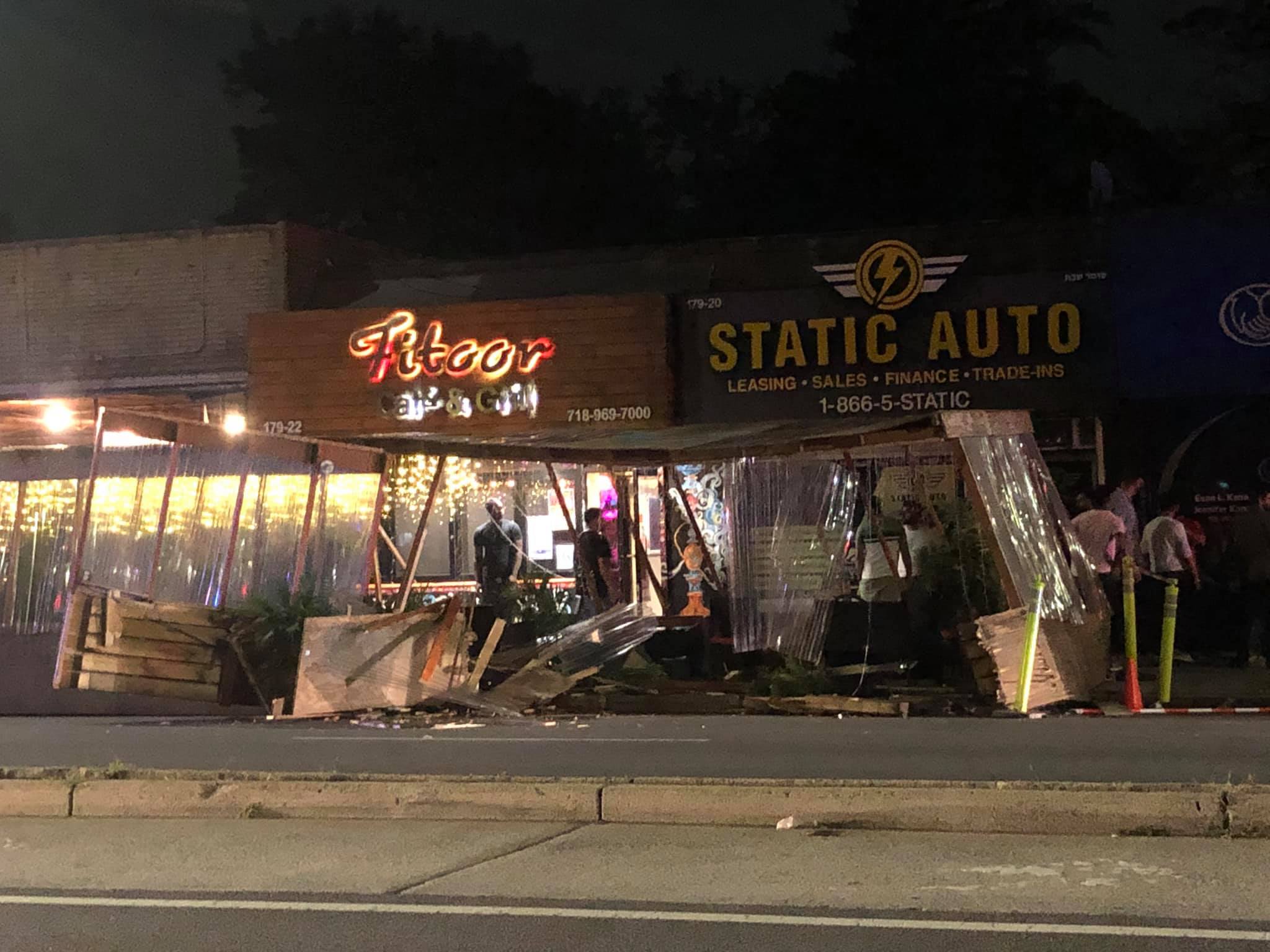 Store front damage and outdoor dining destroyed by reckless driving on Union Turnpike and 179 Street in Fresh Meadows.