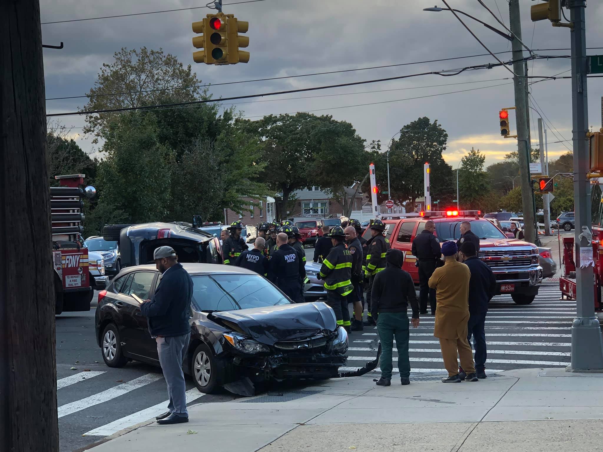 Multiple vehicle accident with one flipped on Little Neck Parkway in Bellerose.