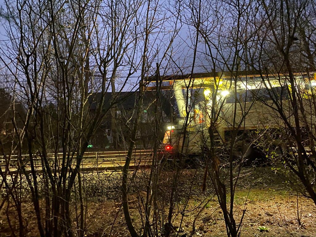 Car fire on the train tracks in Garden City.