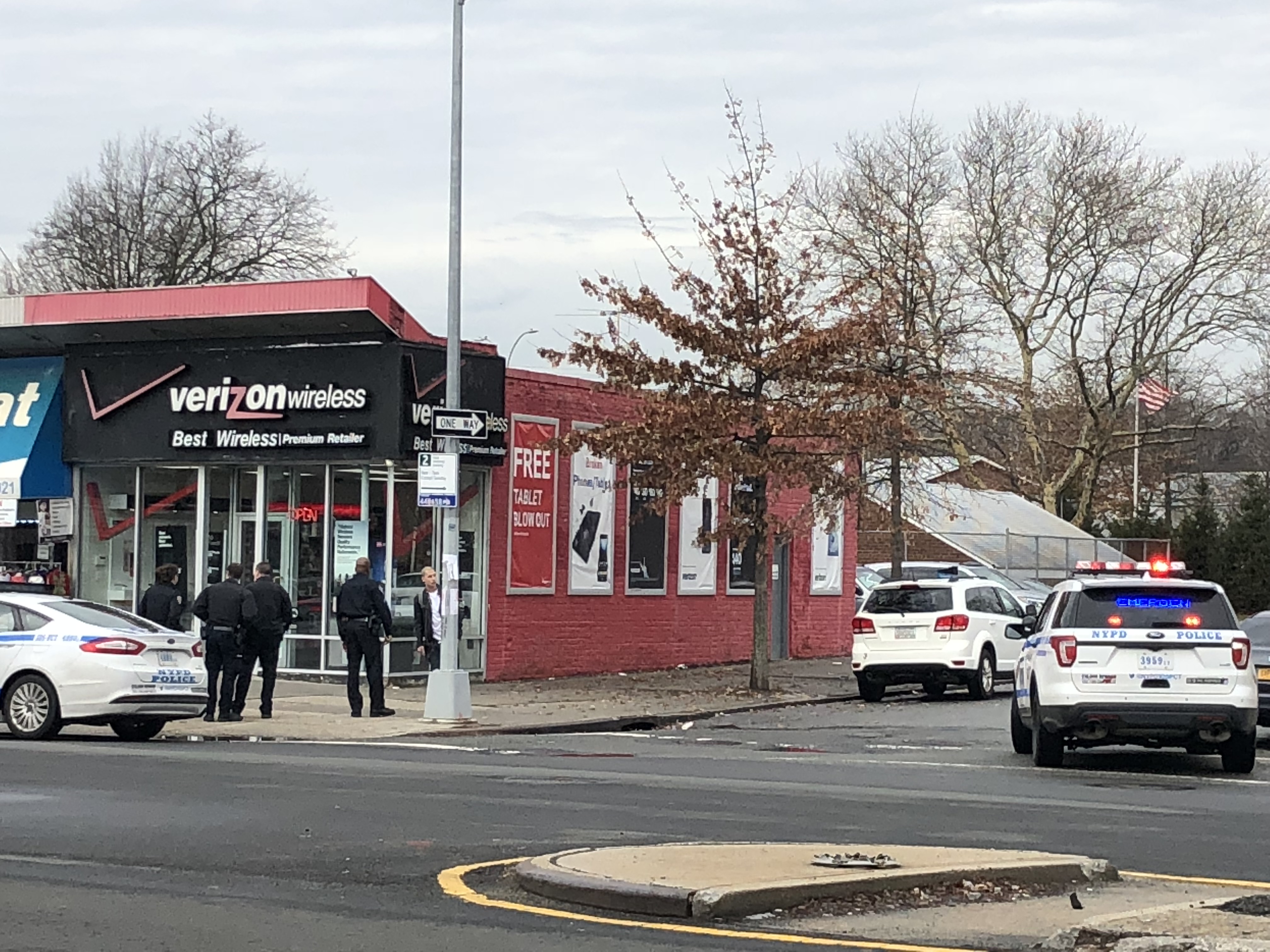 Police investigation at the local phone store in Glen Oaks.