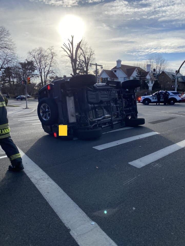 Vehicle flipped during accident on Stewart Avenue in Garden City.