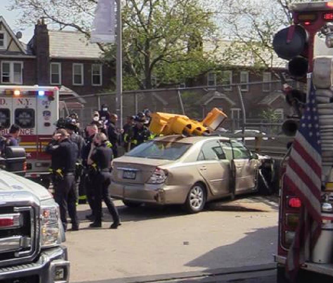 Multiple vehicle accident on the corner of 164 Street and the service road of Grand Central Parkway.