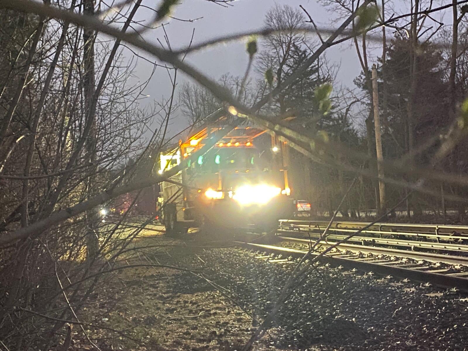 Car fire on the train tracks in Garden City.