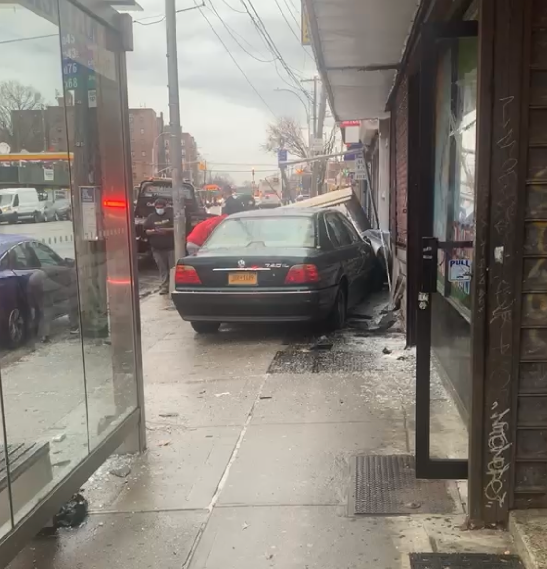 Car hit a building on Hillside Avenue in Jamaica. 