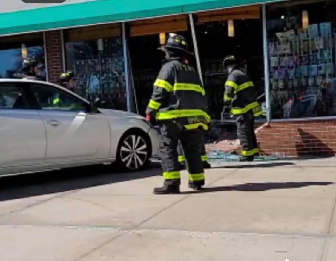 Car hit a building inside the Fresh Meadows shopping center.