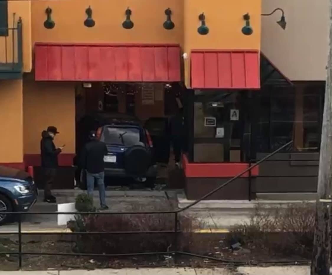 Car went through Popeye's on Hillside Avenue in Queens Village.